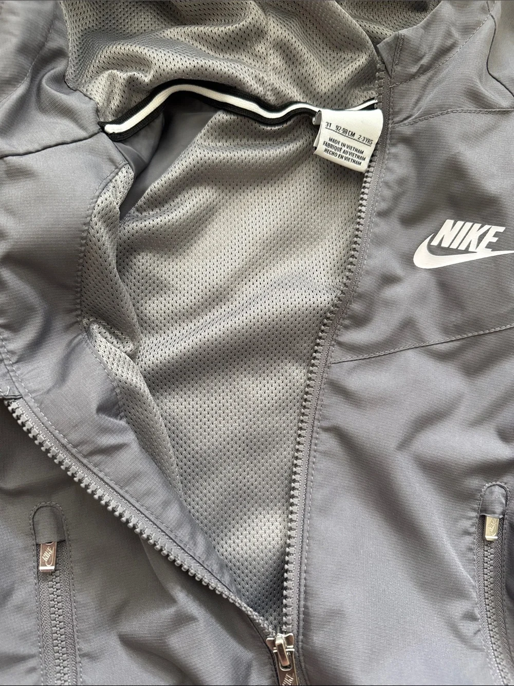 NWOT Nike Kids' Hooded Windbreaker in Gray with White Logo